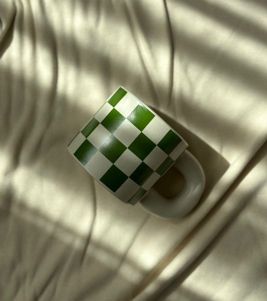 checkered ceramic cup